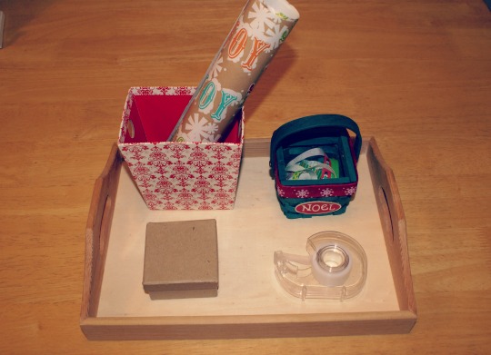 Montessori Christmas Activities for 3 - 6 Year Old's - Wrapping a Present